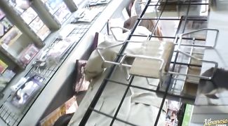 Japanese woman takes pleasure stroking a thick sausage