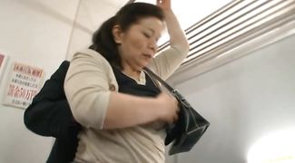 Charming busty Chizuru Iwasaki pleasures a hard prick